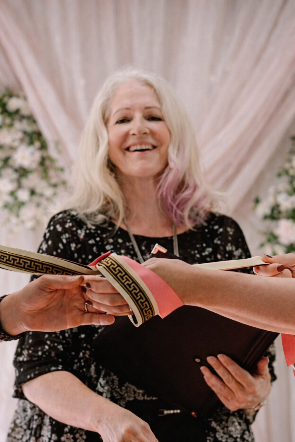 Lise officiating a handfasting ceremony